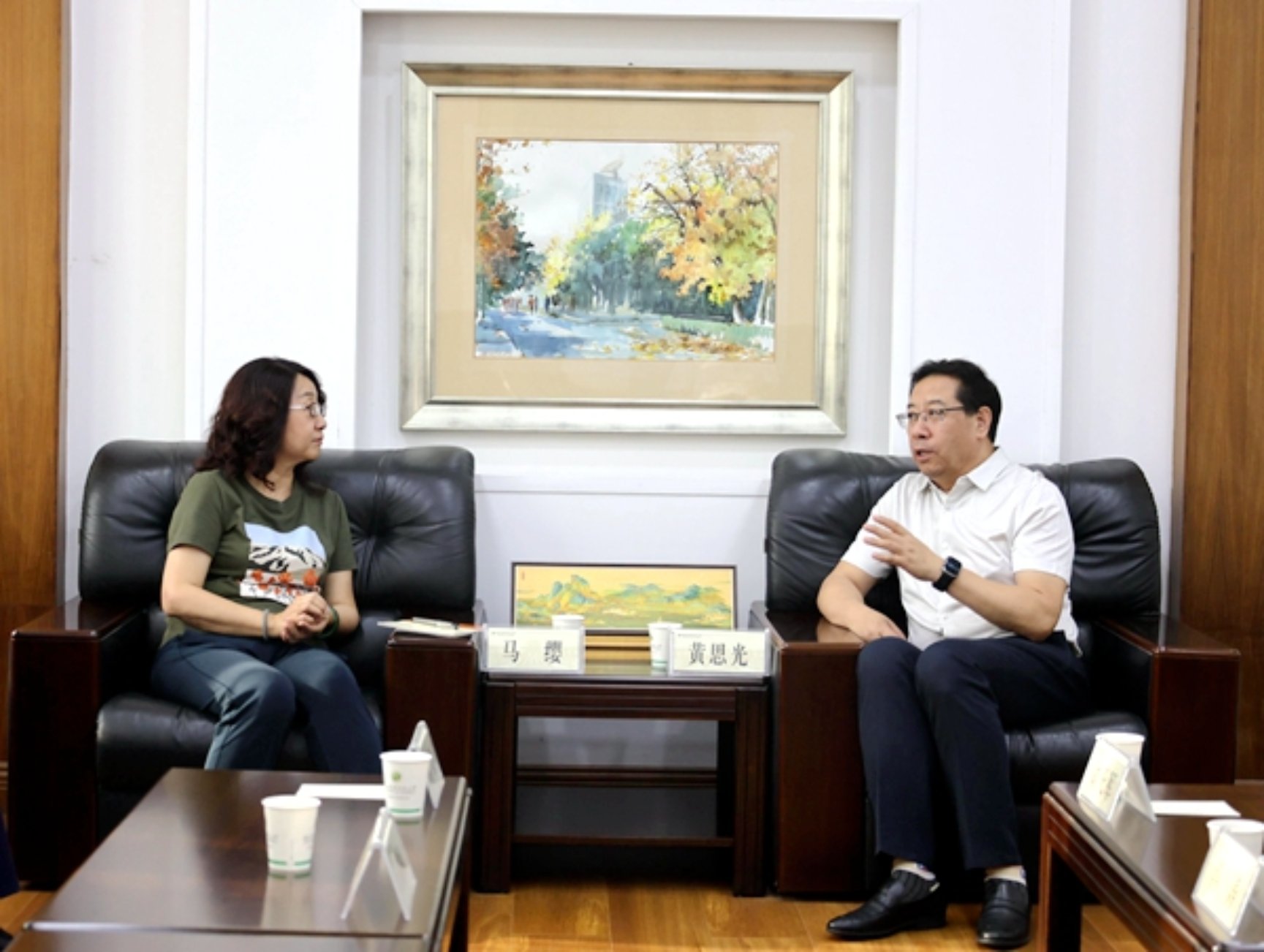 黄思光会见新疆农科院党组书记马缨